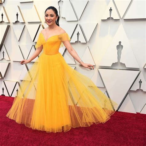 The special meaning behind Constance Wu's yellow Oscars dress